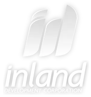 Inland Development Corporation logo