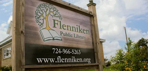 William F & Mary a Flenniken Public Library logo